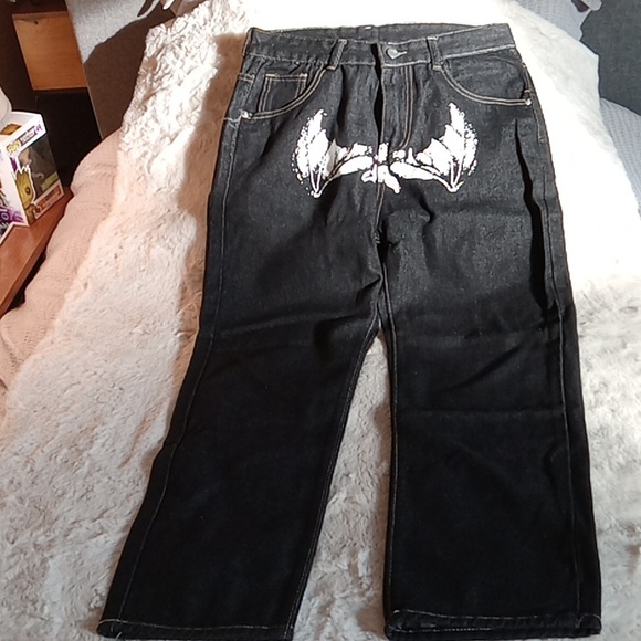 Black double pocket jeans NWOT size M bat image on front, faces back pockets. - Picture 2 of 5